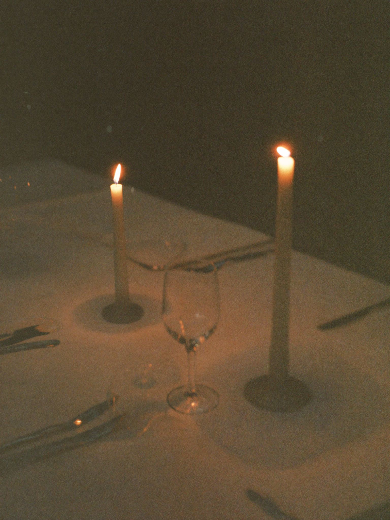 Candles and glassware on a reception table